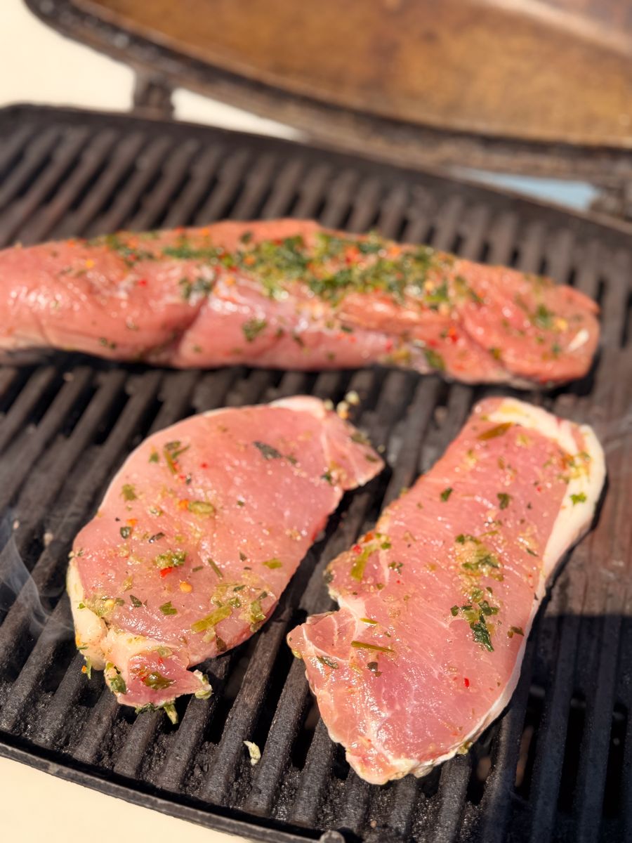 Fresh meat on the live BBQ grill on board